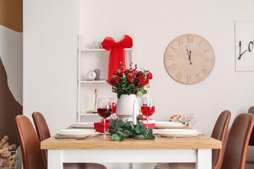 Table setting for Valentine's Day with beautiful flowers in dining room
