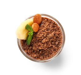 Glass of chocolate pudding with almond, mint and banana slice isolated on white background