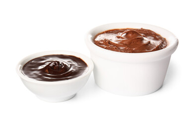 Bowls of delicious chocolate pudding isolated on white background