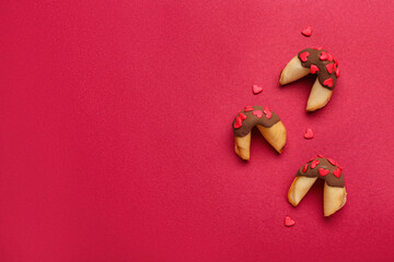 Fortune cookies with hearts on red background. Valentine's Day celebration