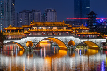 Chengdu Anshun bridge and Jinjiang river at night, Sichuan province, China - 562597247