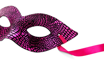 Pink carnival mask for Mardi Gras celebration on white background, closeup