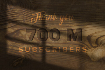 700 Million  subscribers celebration greeting banner with Wooden Engraved Design