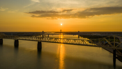 Fototapeta na wymiar Sunrise over the bridges.