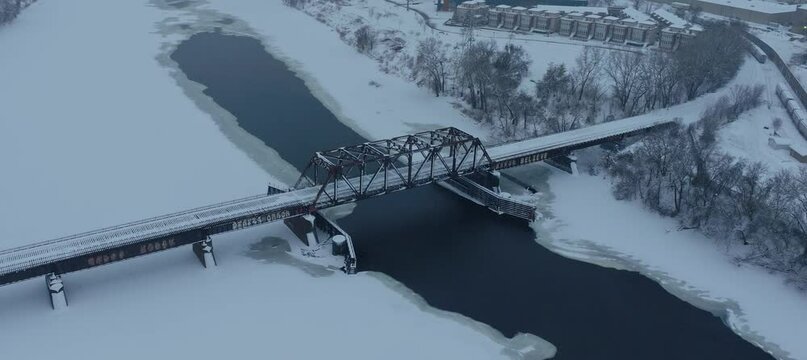 BNSF Rail Bridge In Minneapolis Minnesota In Winter - Aerial Orbit