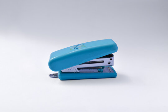 Office stationary Blue stapler isolated on white background