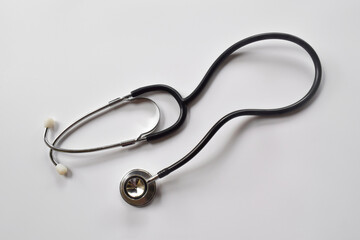 Black stethoscope isolated on white background. Healthcare.