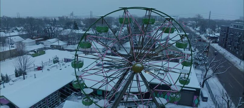 Reverse Aerial Of Snow Covered Ferris Wheel At Betty Danger's NE Minneapolis MN
