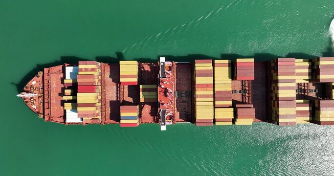 Aerial view Container Cargo Ship carrier container from commercial port for global business logistics, in import and export, shipping or freight transportation. By the sea Worldwide, 4k video