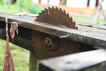 Old and rusty wood rotary saw