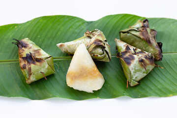 Grilled sticky rice in banana leave with mung beans filling