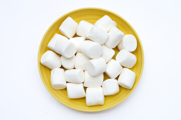 Fototapeta na wymiar White marshmallows on white background.