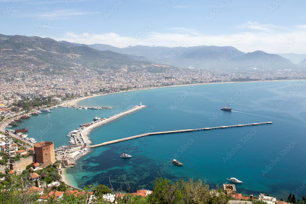 Wall mural View of Alanya harbor. Red Tower and port aerial panoramic view in Alanya city - Wall murals