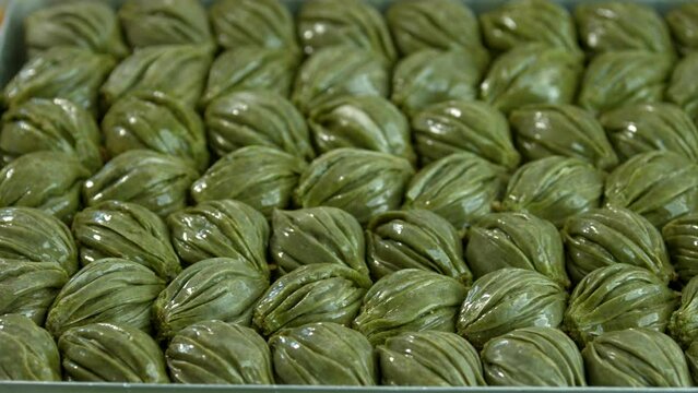 Traditional turkish baklava pistachio pastry. Dilberdudagi, ozel kesim baklava, cikolatali baklava, fistikli baklava, katmer, fistikli kadayif, kattafi, fistik sarma, soguk baklava, midye baklava, cev