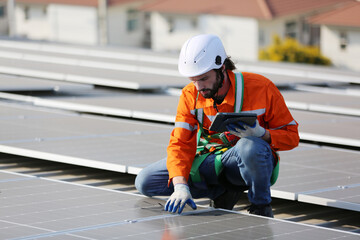 Professional worker installing solar panels on the roof. engineer working on checking equipment in solar power plant, Pure energy, Renewable energy.