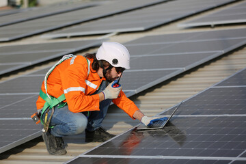 Professional worker installing solar panels on the roof. engineer working on checking equipment in solar power plant, Pure energy, Renewable energy.