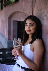 Fototapeta premium Travel, coffee, leisure, lifestyle and people concept -beautiful lady in a restaurant. portrait of a beautiful young woman 