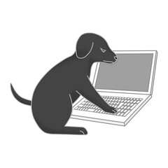 ノートパソコンと黒色の仔犬