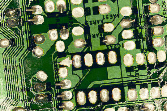 Reverse side of the electronic circuit board close-up