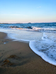 Sunset on the beach. Sea view. On the shore of the Japanese sea.