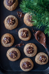 sweet home made chocolate christmas cookies on a christmas table