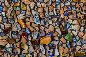  background from pieces of clay colored broken pottery decoration abstract