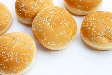 Hamburger buns with sesame on white background.