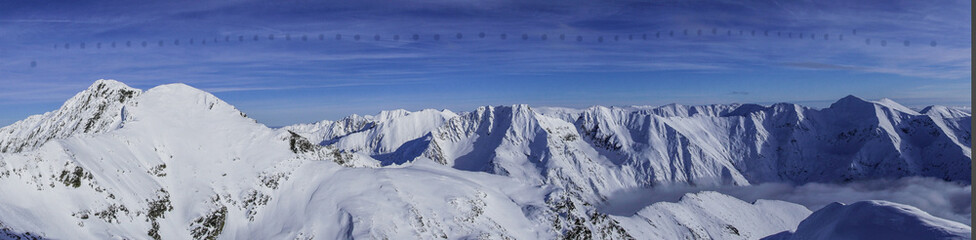 snow covered mountains, panoramic photography from Iezerul Caprei Peak, Fagaras Mountains, Romania 
