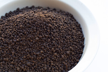 Fertilizer, chicken manure pellets. Natural plant food