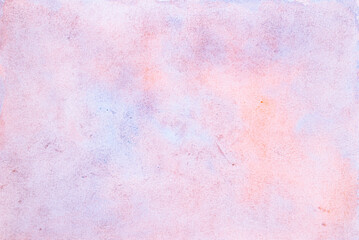 Abstract pink, orange, yellow and blue watercolor and paper texture background.