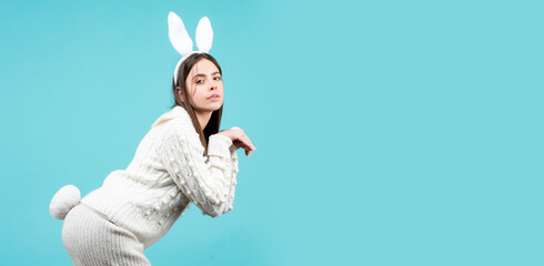 Horizontal photo banner for website header design. Easter bunny girl. Surprised girl with bunny...