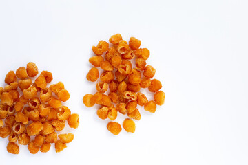 Dried longan on white background.