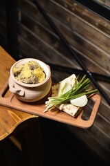 Armenian traditional ghavorma meat in a clay dish with onions