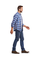 Studio shot of a man walking Isolated on a PNG background.