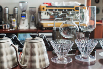 Devices for manual brewing in the background.