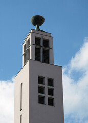 Tower of the Hussite Church with a bronze bowl on top in the city of Tabor, Czech Republic 