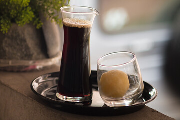 black coffee with milk ice ball