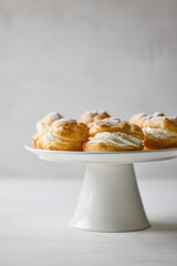 plate of cream puffs