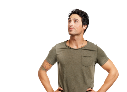 A handsome young man standing with hands on his hips looking up Isolated on a PNG background. - Powered by Adobe