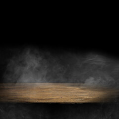 Dark empty wooden table with smoke float up on dark wall background. Free space for your...