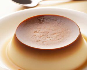 Close up of flan on white plate created using generative ai technology