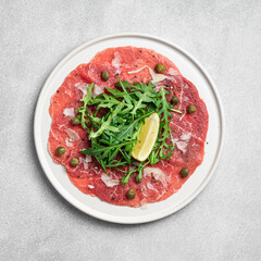 Beef carpaccio, traditional italian appetizer, view from above