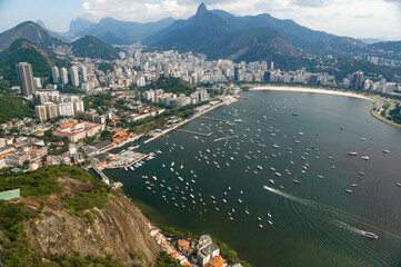 Obraz premium View of Guanabara Bay, Botafogo and, in the distance, the Christ the Redeemer statue on Corcovado mountain. Rio de Janeiro. Brasil.