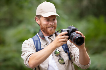 a happy photographer taking photos