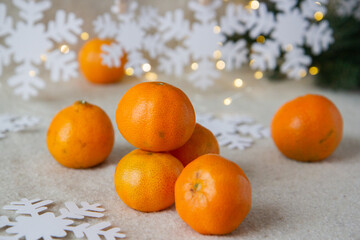 Fototapeta na wymiar tangerines on a wooden background
