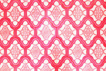 Ceramic tiles with a pink eastern pattern.