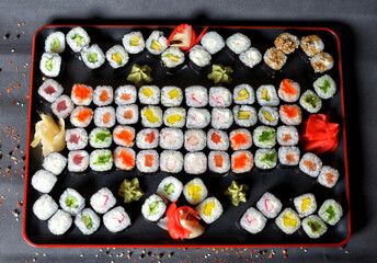 Sushi roll mix set with cheese, fish, salmon, caviar, Sesame , ginger.