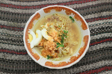 Soto is a typical Indonesian food with sauce and egg slices