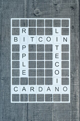 Mots croisés avec les mots Ripple, Bitcoin, Litecoin, Cardano. Concept de message sur la...