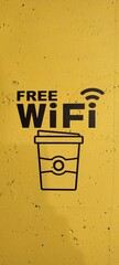 FREE WI-FI text concept for presentations and reports on yellow wall